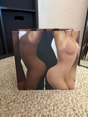 SKIMS Dual-Tone Nude & Brown Graphic Gift Bag